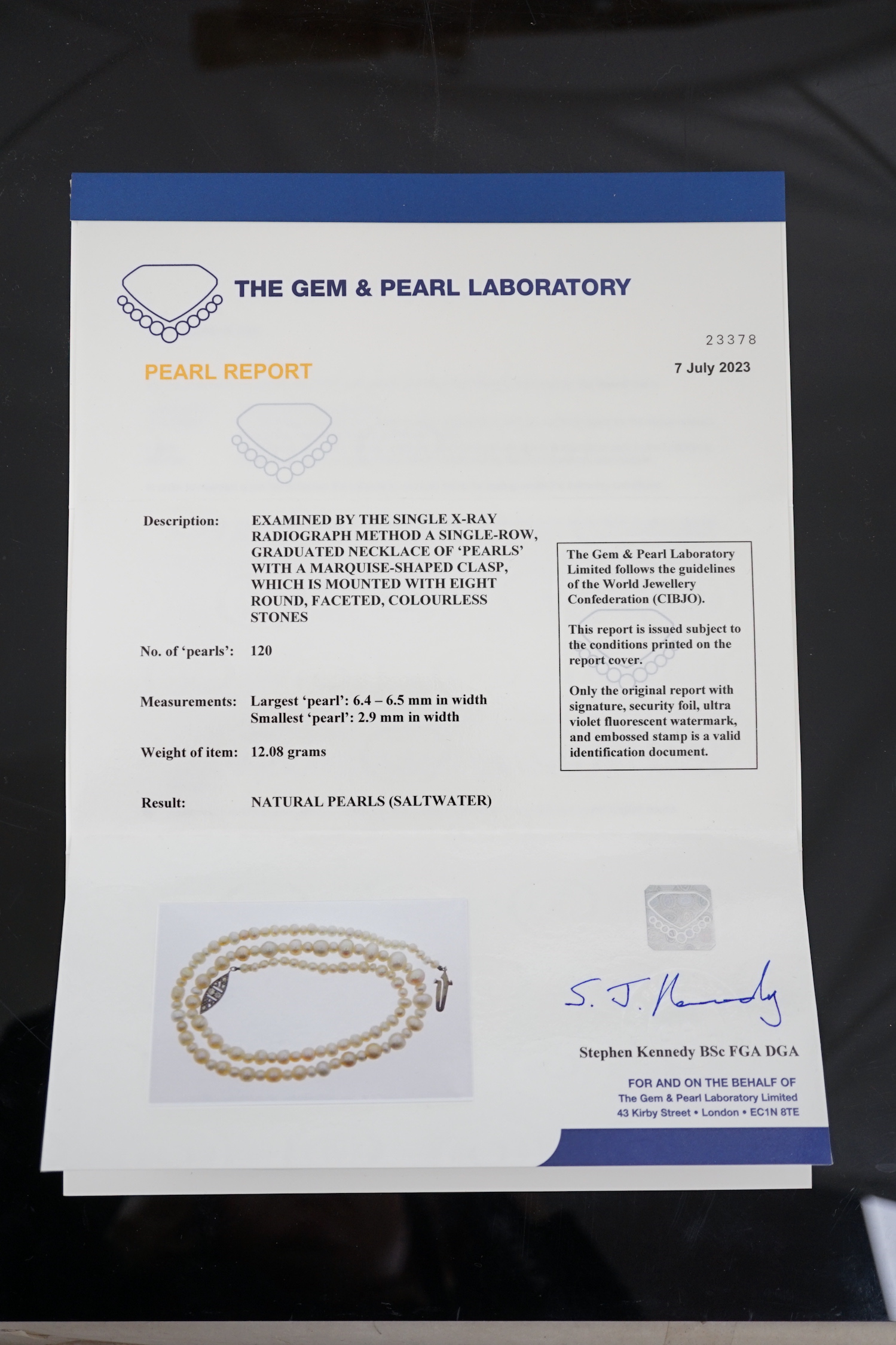 A late 19th century single strand graduated natural saltwater pearl necklace, with a French 18ct white gold and millegrain set diamond marquise shaped clasp